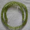 AAA quality Peridot smooth roundel 11 inch strand 4mm approx
